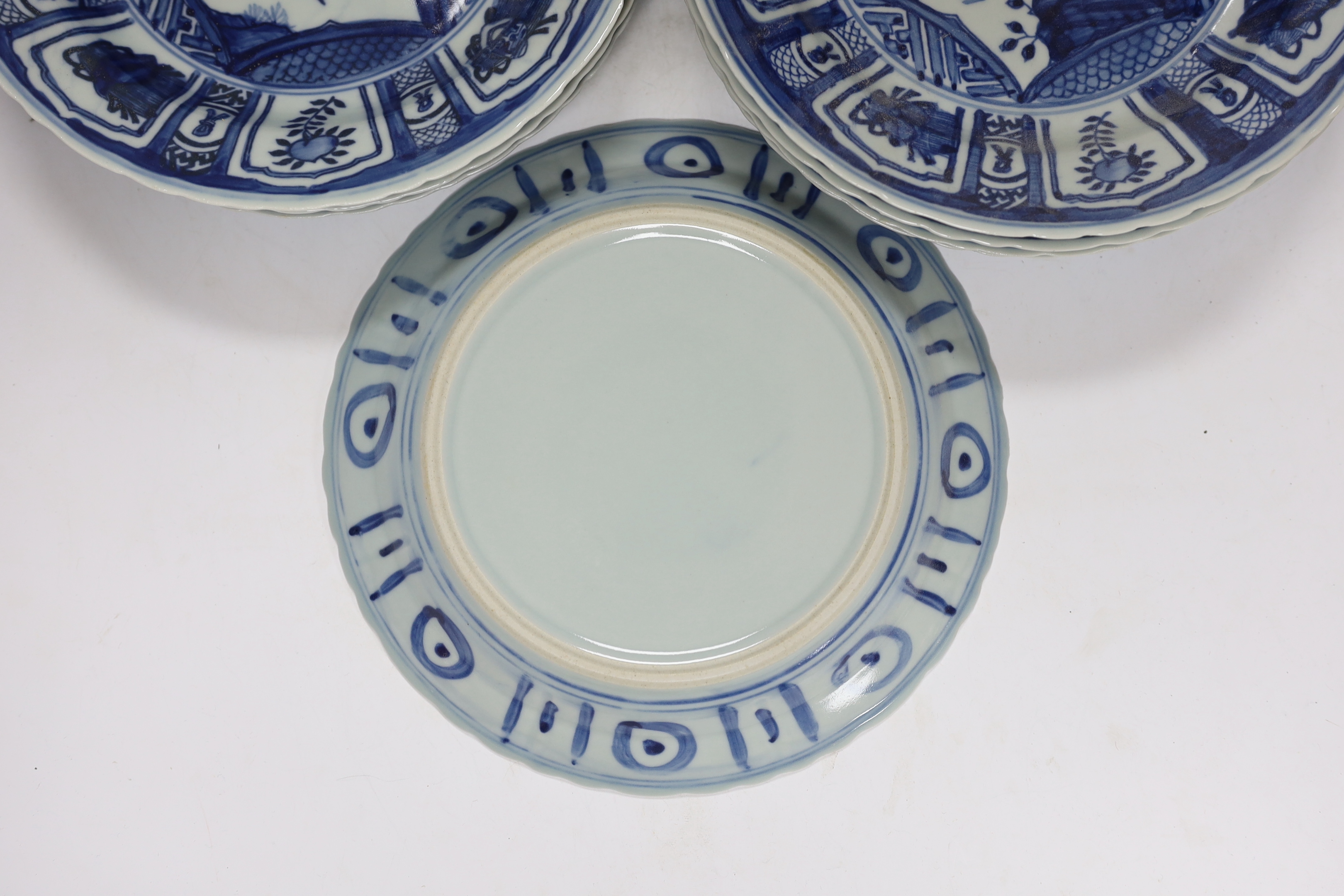 A group of Chinese blue and white dishes and plates and a damaged vase, 30cm